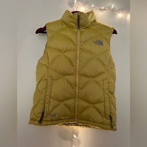 The North Face yellow puffer vest